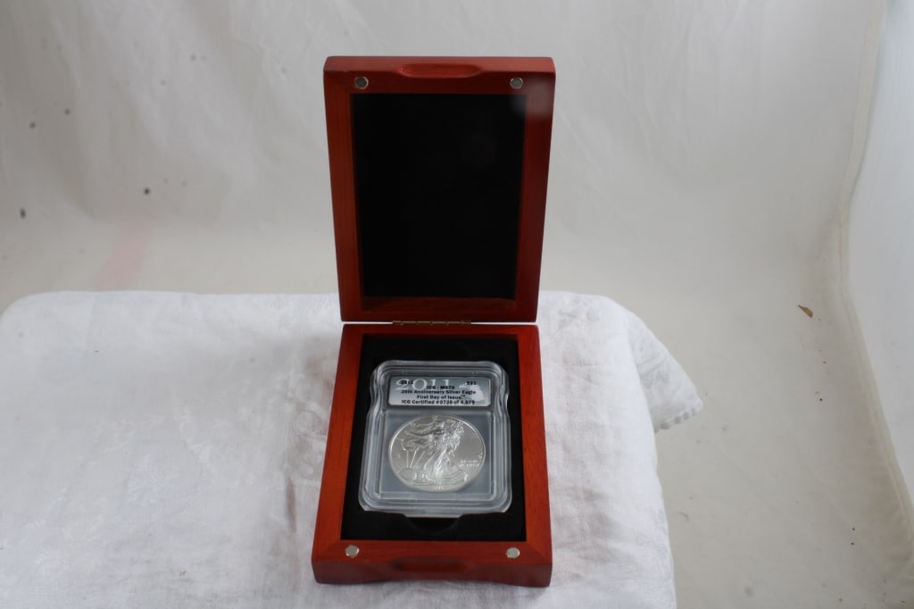 2011 25th Anniversary 1 Oz. Fine Silver Eagle: 2011 25th Anniversary 1 Oz. Fine Silver Eagle - 8 Oz. Lot Size 5" x 3.5" x 1.5". Photos are part of description (Live Auctioneers only shows up to 20). Please ask questions and read terms &