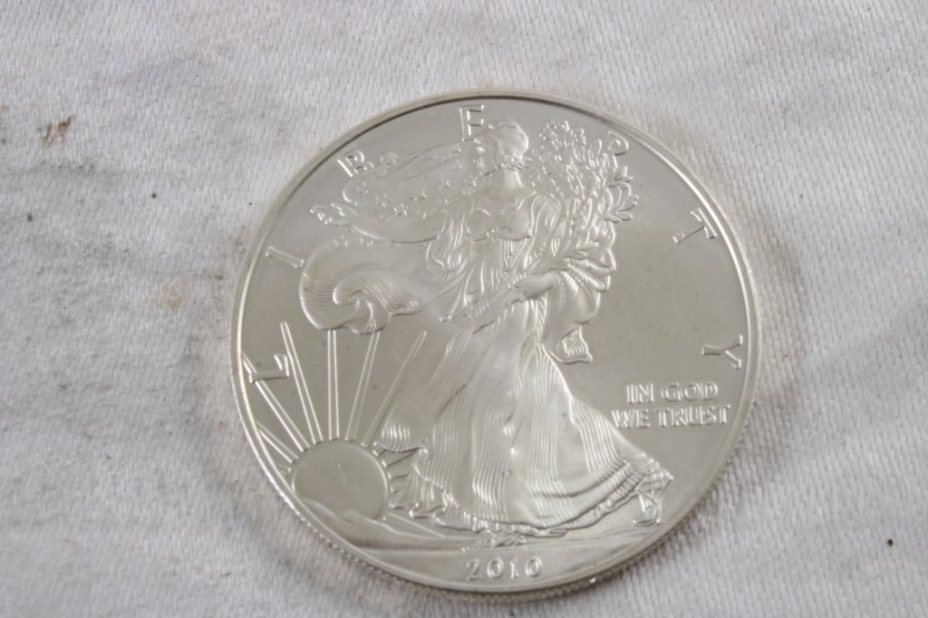 2010 1 Oz. Fine Silver Eagle: 2010 1 Oz. Fine Silver Eagle - 3 Oz. Lot Size 1.5" Diameter Photos are part of description (Live Auctioneers only shows up to 20). Please ask questions and read terms & conditions before bidding. 