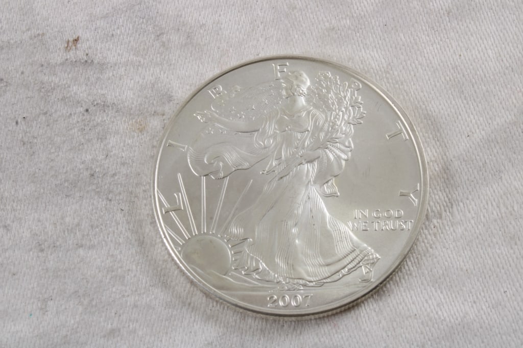 1 Oz. Fine Silver Eagle: 1 Oz. Fine Silver Eagle - 3 Oz. Lot Size 1.5" Diameter. Photos are part of description (Live Auctioneers only shows up to 20). Please ask questions and read terms & conditions before bidding. 