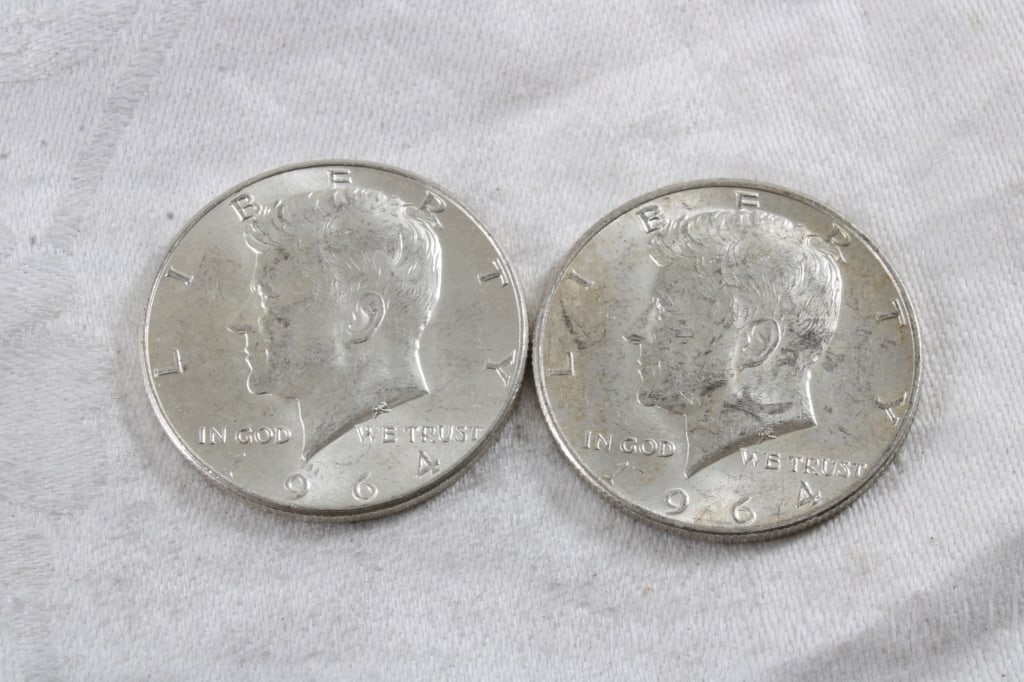 2 1964 JFK Silver Half Dollars: 2 1964 JFK Silver Half Dollars - 3 Oz. Lot Size 1.25" Diameter. Photos are part of description (Live Auctioneers only shows up to 20). Please ask questions and read terms & conditions before