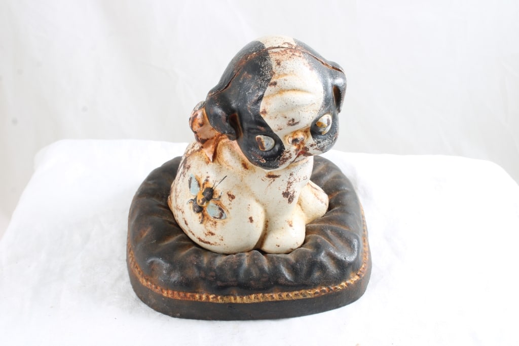 Hubley Cast Iron Dog on Pillow Still Bank: Hubley Cast Iron Dog on Pillow Still Bank - 4 Lbs. Lot Size 6" x 5" x 5". Photos are part of description (Live Auctioneers only shows up to 20). Please ask questions and read terms & conditions before