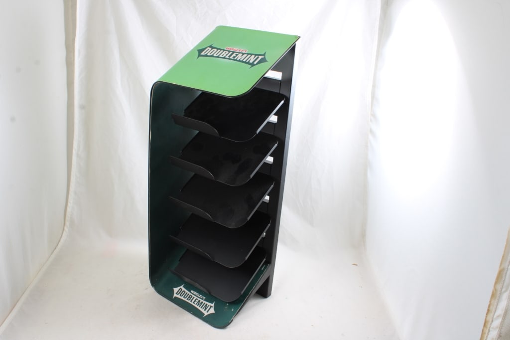 Wrigley's Double Mint Gum Store Counter Display: Wrigley's Double Mint Gum Store Counter Display - Metal 5 Shelf Gum Display. 10 Lbs. Lot Size 21" x 8" x 8". Photos are part of description (Live Auctioneers only shows up to 20). Please ask