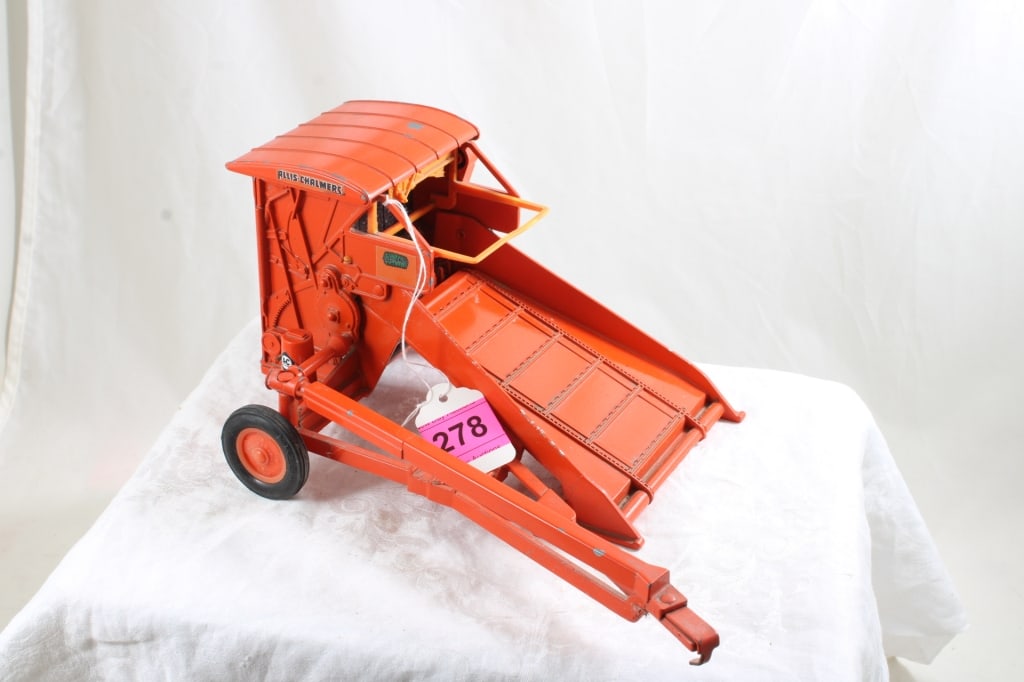 Allis Chalmers Ertl Diecast Roto Baler 1:16 Scale: Allis Chalmers Ertl Diecast Roto Baler 1:16 Scale - 2 Lbs. Lot Size 12" x 12" x 8". Photos are part of description (Live Auctioneers only shows up to 20). Please ask questions and read terms & conditi