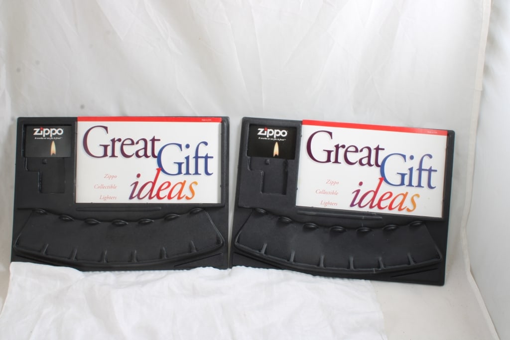 2 Zippo Plastic Store Displays: 2 Zippo Plastic Store Displays - Each one would have held 7 lighters. 2 Lbs. Lot Size 13" x 9" x 2". Photos are part of description (Live Auctioneers only shows up to 20). Please ask questions and rea