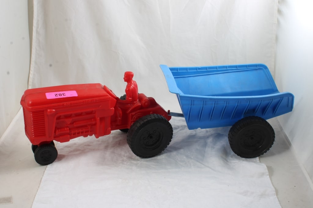 26" Irwin Toys Tractor & Farm Wagon: 26" Irwin Toys Tractor & Farm Wagon - Rare large Tractor and Wagon by Irwin Toys. 26" Long. Lot size: 12 x12 x 10", 3 lbs Photos are part of description (Live Auctioneers only shows up to 20). Please