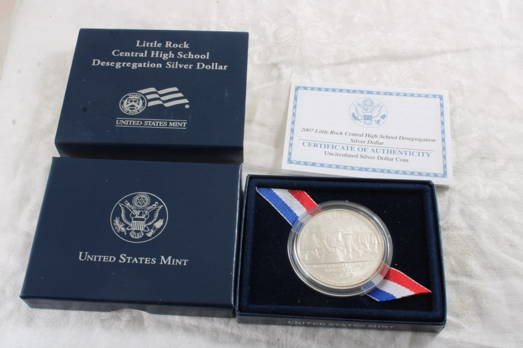 2007 Silver Dollar 90% Silver Commemorative: 2007 Silver Dollar 90% Silver Commemorative - Little Rock Central High School Desegregation Silver Dollar with COA. 12 Oz. Lot Size 4" x 4" x 4". Photos are part of description (Live