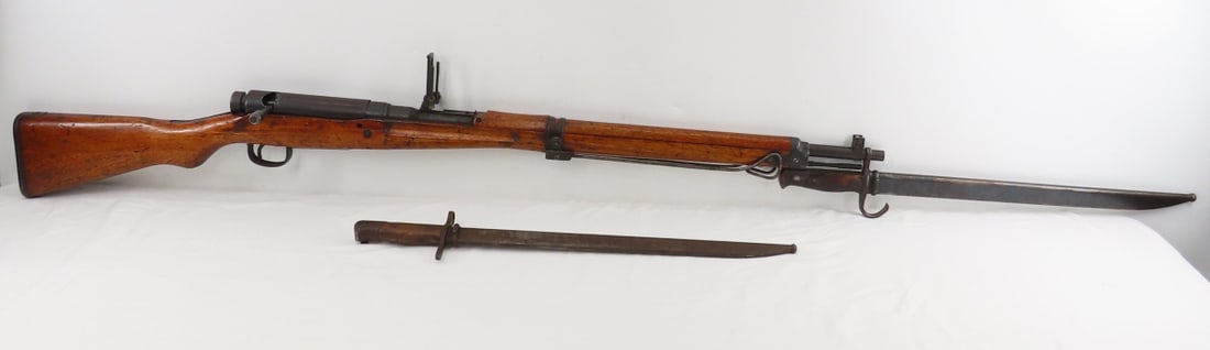 Type 99 Arisaka Anti-Aircraft 7.7 Rifle & Bayonets: Type 99 Arisaka Anti-Aircraft 7.7 Rifle & Bayonets - SN# 92991, full mum, 31st series Toyo Kogyo Arsenal, bolt action with dust cover, 5 round internal, 26" barrel, 44" OAL, anti aircraft sights, and