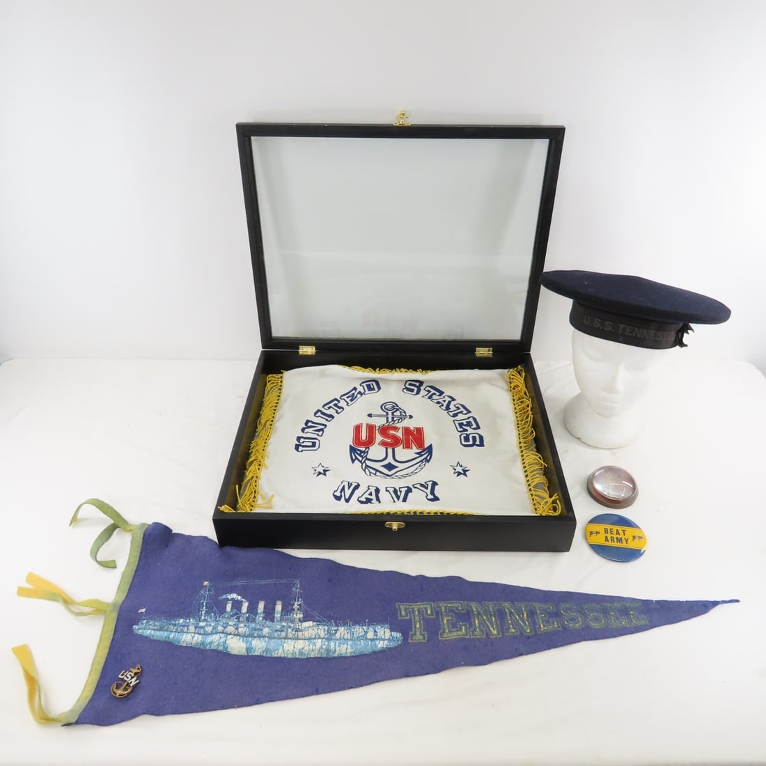 US Navy Shadowbox, Sports Pennant, Paperweight: US Navy Shadowbox, Sports Pennant, Paperweight - Hat and more. Shadowbox measures 20x16x3.25", items can be shipped without box to save some in shipping. Lot size 20x16x4" 8lb Photos are part of