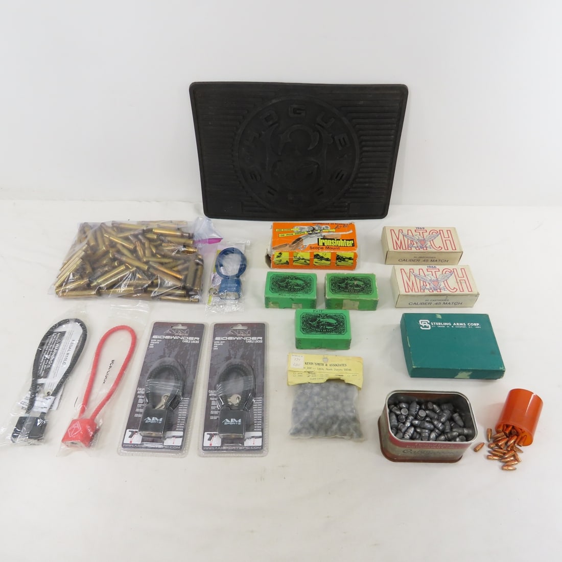 Reloadable Brass, Bullets, scope mount, gun locks: Reloadable Brass, Bullets, scope mount, gun locks - 1 bag of 109 count of 30-06 brass cases, mix of headstamps including US military, Tin can of .38 cal projectiles (cast bullets), approx. 150