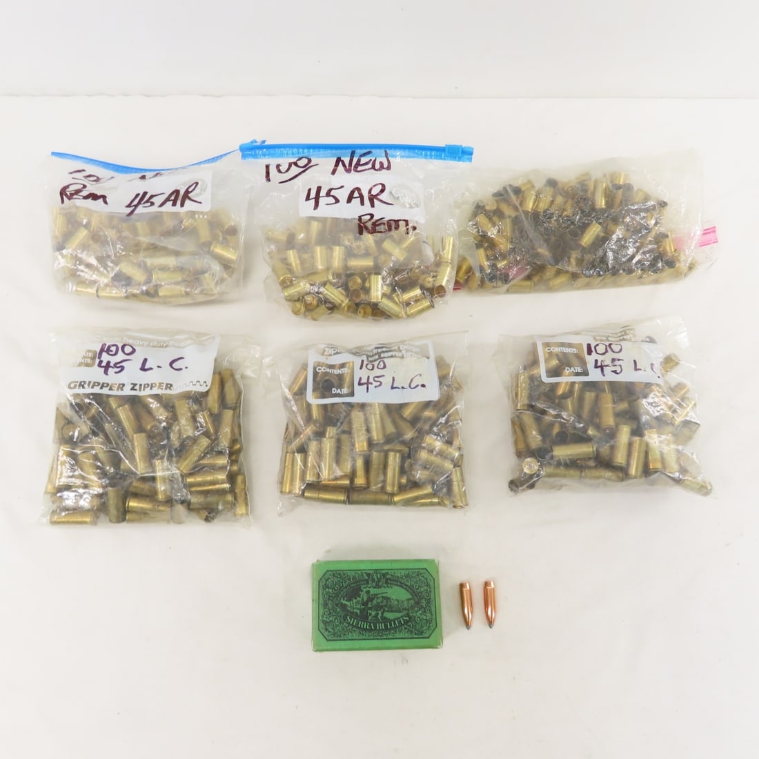 .45 Auto & .45 Long Colt brass for reloading: .45 Auto & .45 Long Colt brass for reloading - plus approx 50 Sierra Bullets .375 cal 300 grain. 300 brass cases of .45 long colt once fired brass with spent primers in place. 314 brass cases 45