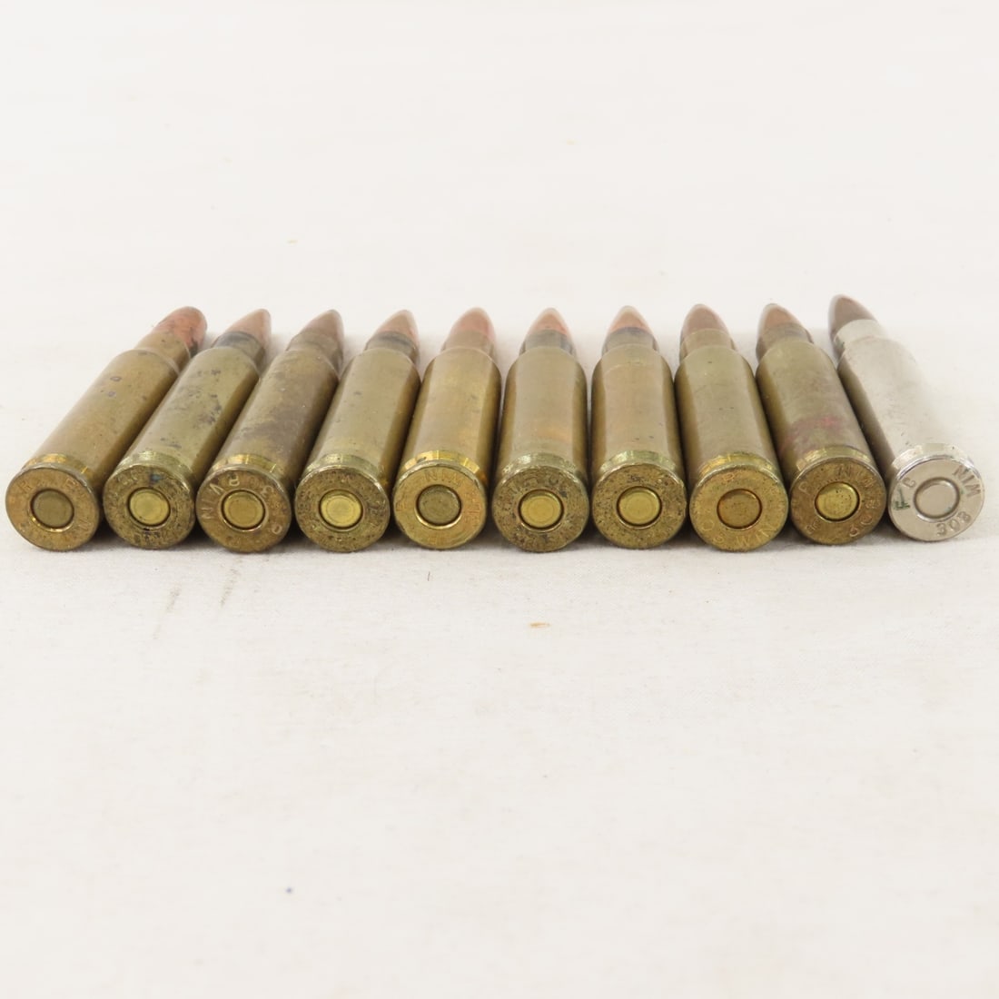 Mixed Rifle ammunition and brass cases - 12