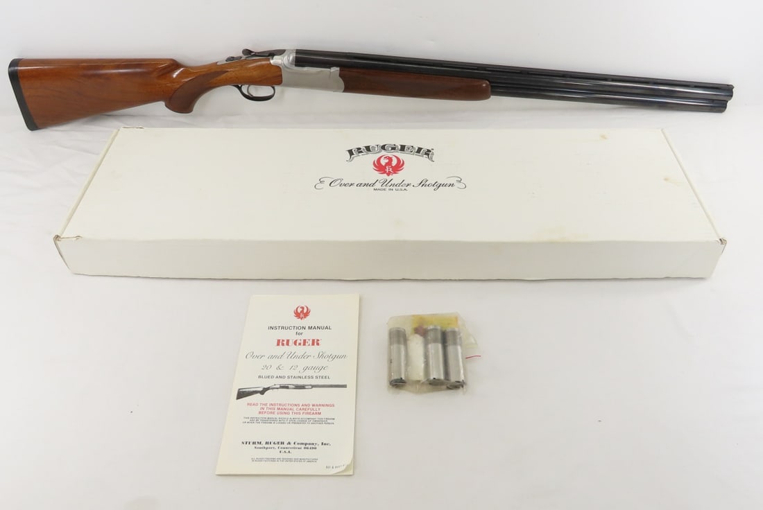 Ruger Red Label O/U 12GA Shotgun: Ruger Red Label O/U 12GA Shotgun - SN# 410-68934, manufactured 1994, 28" over under vent rib barrel with front bead sight, 3" chambers, 5 chokes included with key & lube, stainless receiver, blued bar