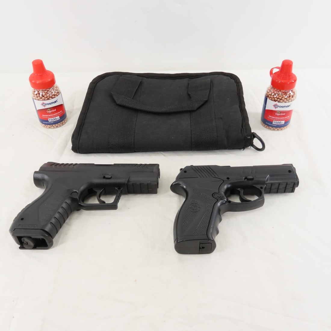 Crosman C11 & Umarex XBG CO2 .177 BB Pistols: Crosman C11 & Umarex XBG CO2 .177 BB Pistols - 1 magazine- works in either one, 3 bottles of 1500 BB's ( 1 did not make photos) , and soft case. No CO2 included. Please know local laws before