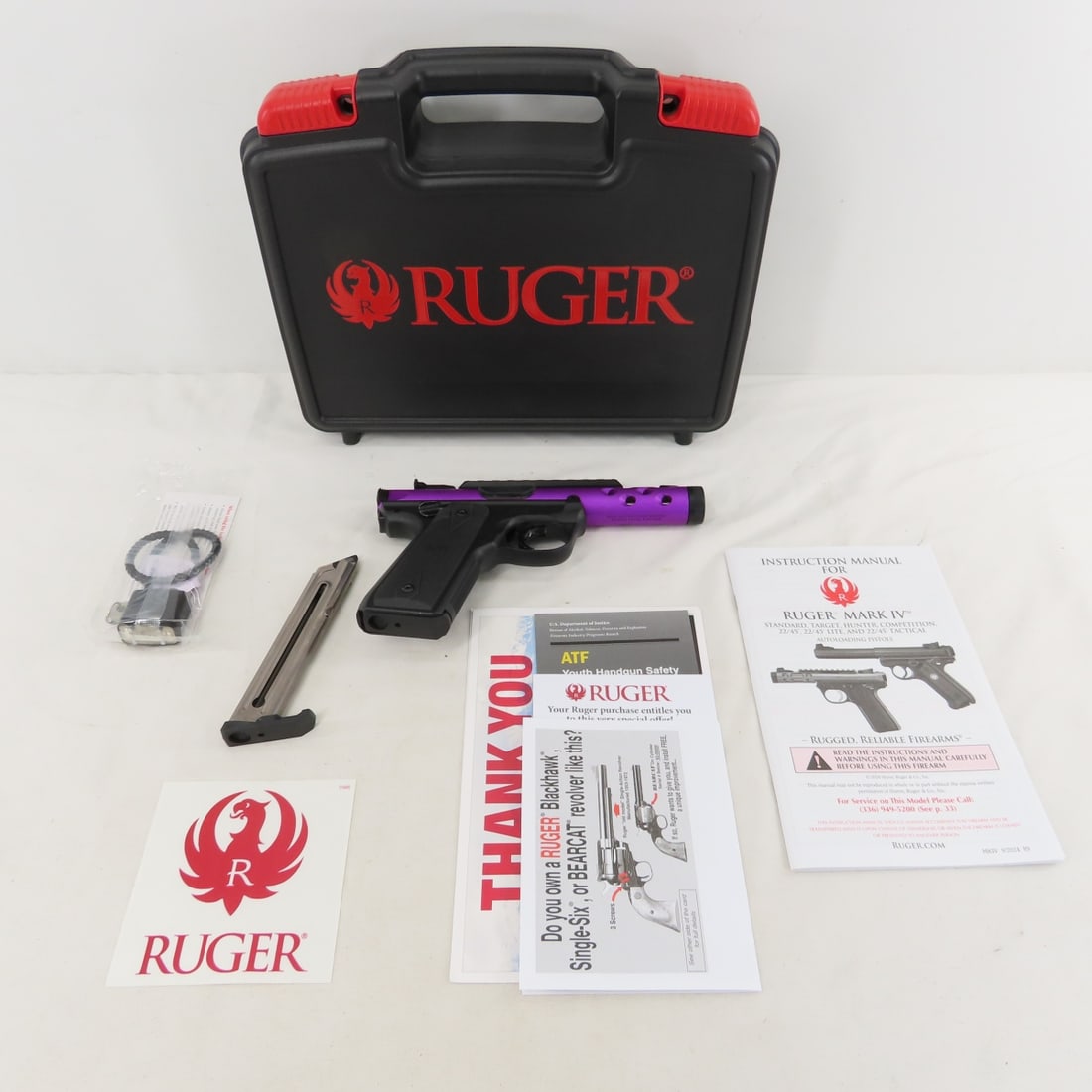 Ruger Mark IV Lite 22/45 .22 Pistol Model 43915: Ruger Mark IV Lite 22/45 .22 Pistol Model 43915 - Serial number 500643503, 4.4" Threaded barrel, 2 10+ 1 magazines, purple anodized aluminum, lock, and original case with paperwork. FFL transfer requi