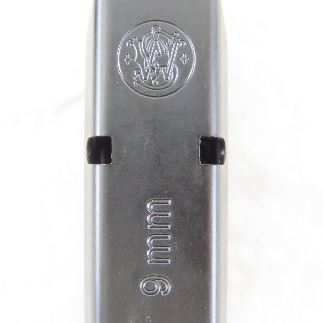 4 Smith & Wesson 9mm magazines - 8