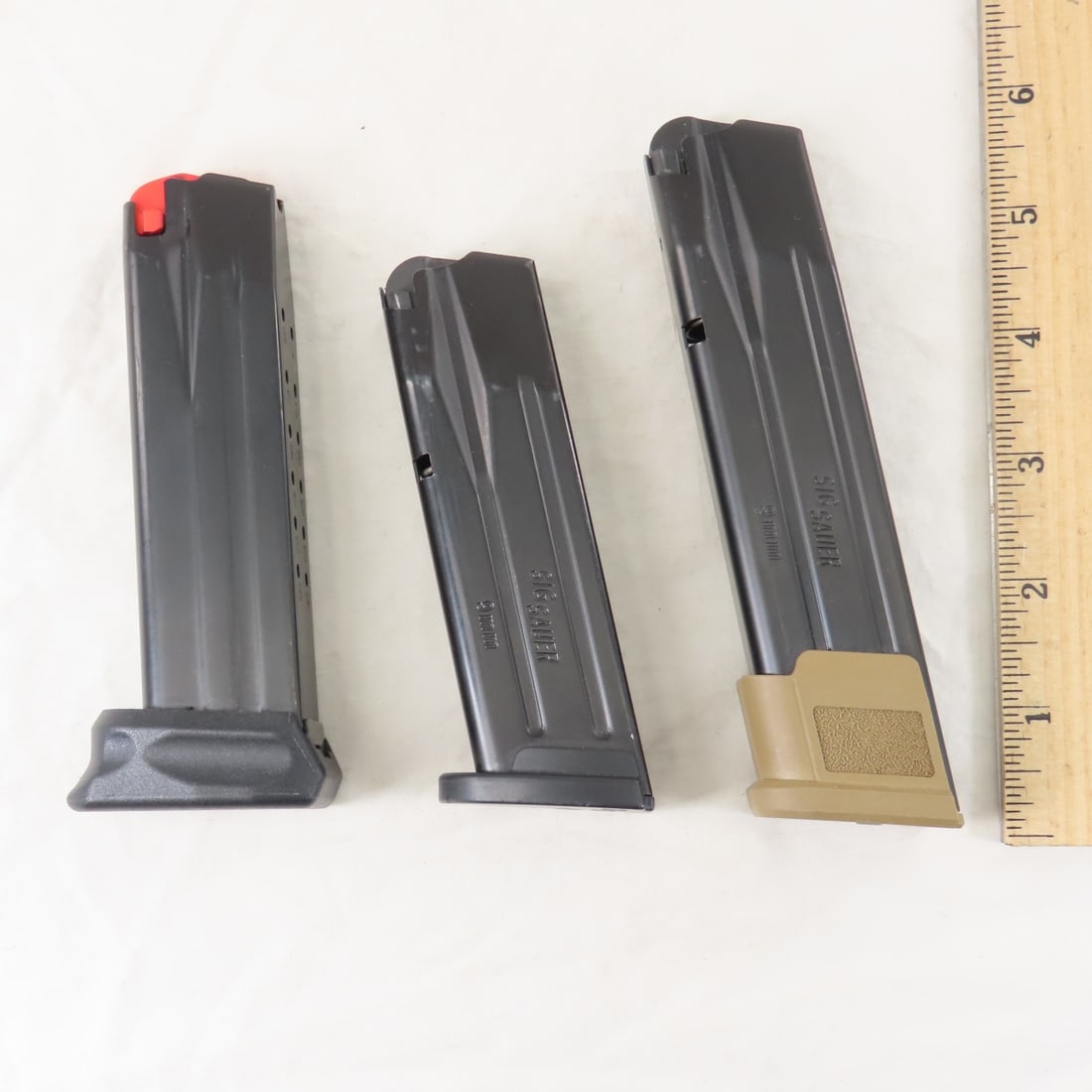 2 Sig Sauer & 1 Walther 9mm Magazines - 2
