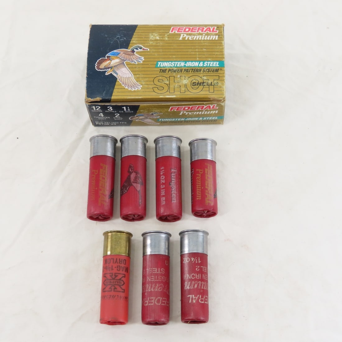 Ammunition: 31 Mixed 12 GA & 2 Oil Cans - 9