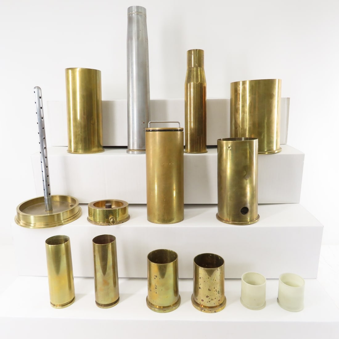 Collection of Large Caliber WWII Brass Casings: Collection of Large Caliber WWII Brass Casings - Some WWII, Some have been altered. 75mm M18 1945, 40mm MK2 1944, 37mm M16 1941, 105mm M14 1945, 40mm MK3, 75mm Drill Cartridge 1934 & others