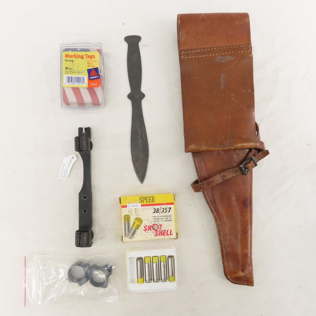Holster, ammunition, cleaning kits, laser sight - 11