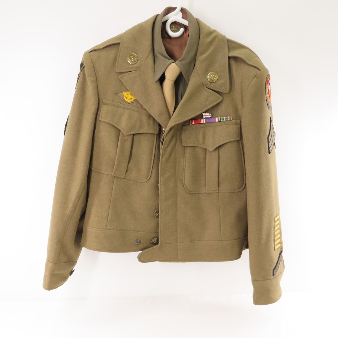 WWII US Army "Ike" Jacket, Named Sgt. W.C. Wallin: WWII US Army "Ike" Jacket, Named Sgt. W.C. Wallin - W.C. Wallin, Service # 39180102. Size: 40S, Insignia & Awards: Purple Heart, Good Conduct Medal, European-African Middle Eastern Campaign Medal,