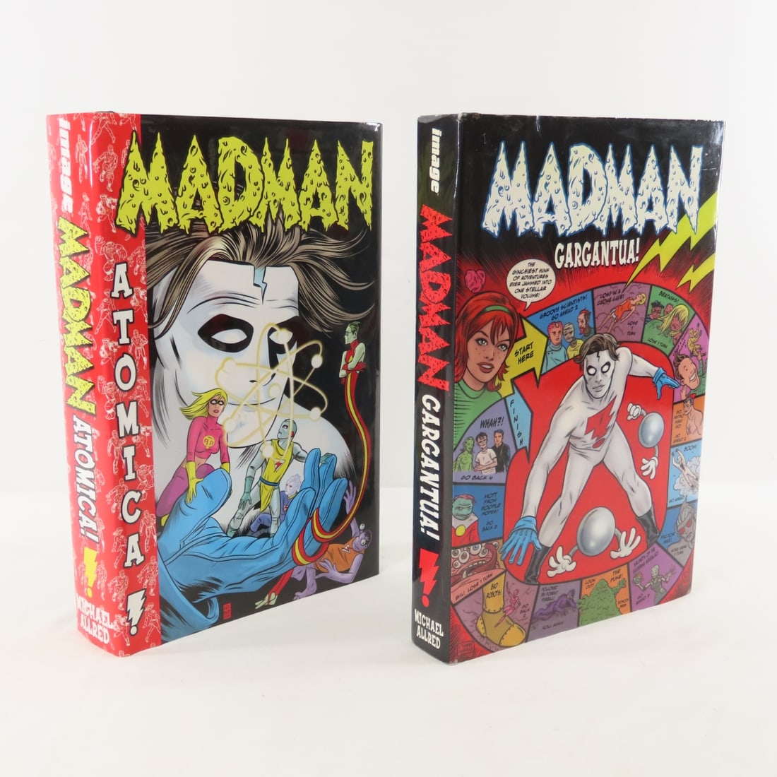 Madman Atomica! & Madman Gargantua! Hardcover: Madman Atomica! & Madman Gargantua! Hardcover - both opened and in excellent condition. Lot Size 12x8x4" 12lb Photos are part of description. Max of 20 photos are shown in Live Auctioneers, all are