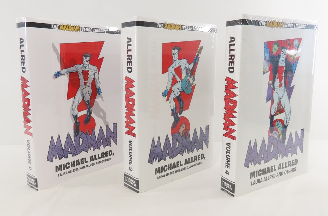 Madman Library Edition Vol 2,3,4 HC Sealed: Madman Library Edition Vol 2,3,4 HC Sealed - Lot Size 15x10x6" 20lb Photos are part of description. Max of 20 photos are shown in Live Auctioneers, all are shown on Proxibid and