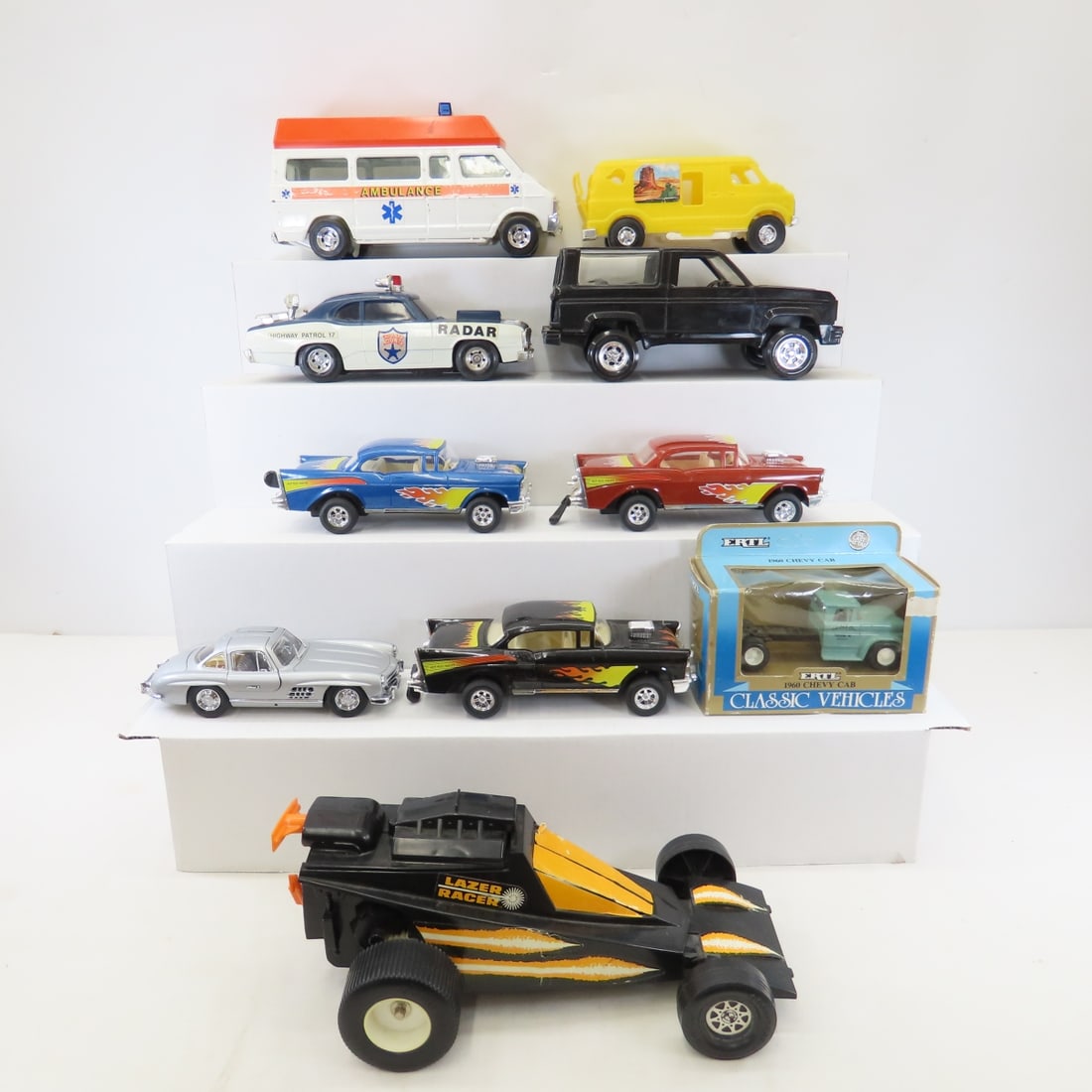 ERTL Ambulance, YCT Pull String Hot Rods & More: ERTL Ambulance, YCT Pull String Hot Rods & More - 1977 GLJ police car, 3 YCT pull string hot rods- work, Lazer Racer-pull string- not working consistently, Processed plastics van (broken hinge on