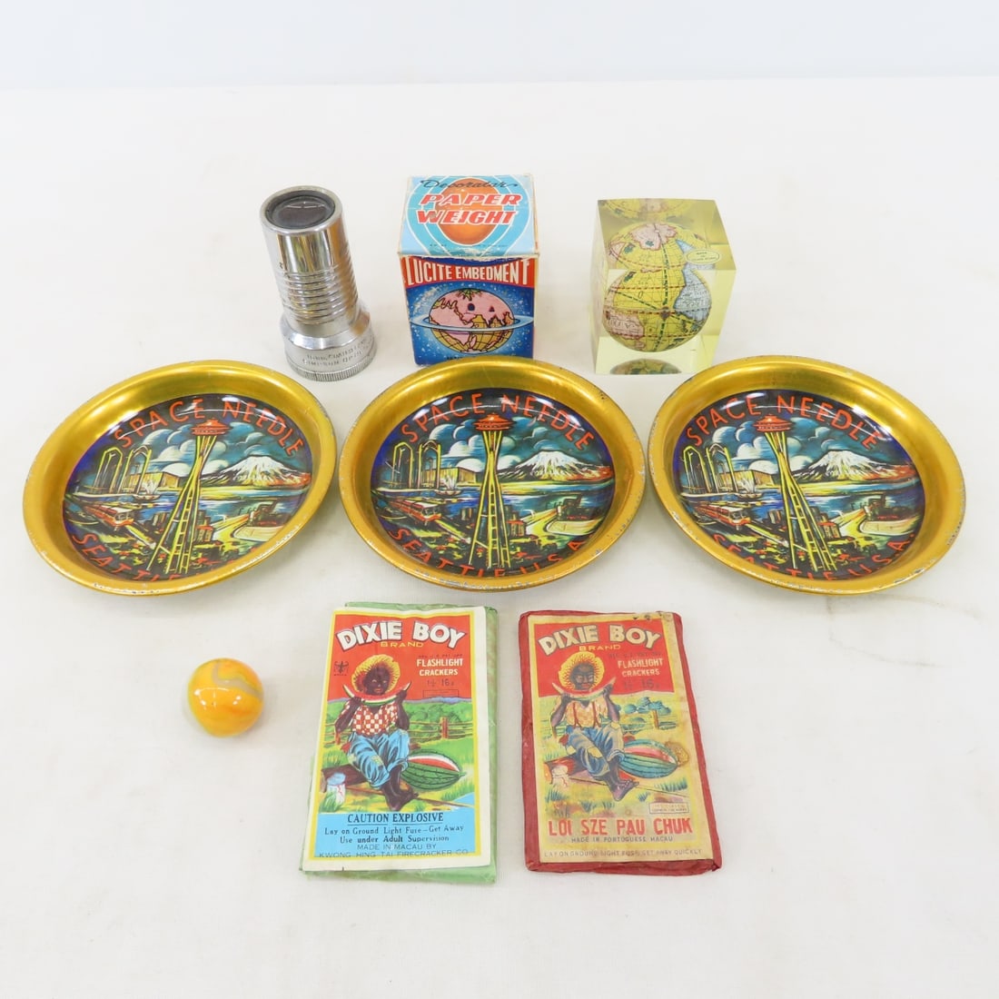 Dixie Boy Flashlight Crackers, Paper Weight & More: Dixie Boy Flashlight Crackers, Paper Weight & More - Space Needle tins, Simpson 2" magnifier, globe paper weight. Lot size: 5x5x5", 1lb Photos are part of description. Max of 20 photos are shown in Li