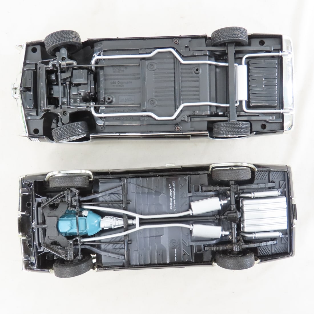 12 1:18 scale Muscle Cars - no boxes - 13