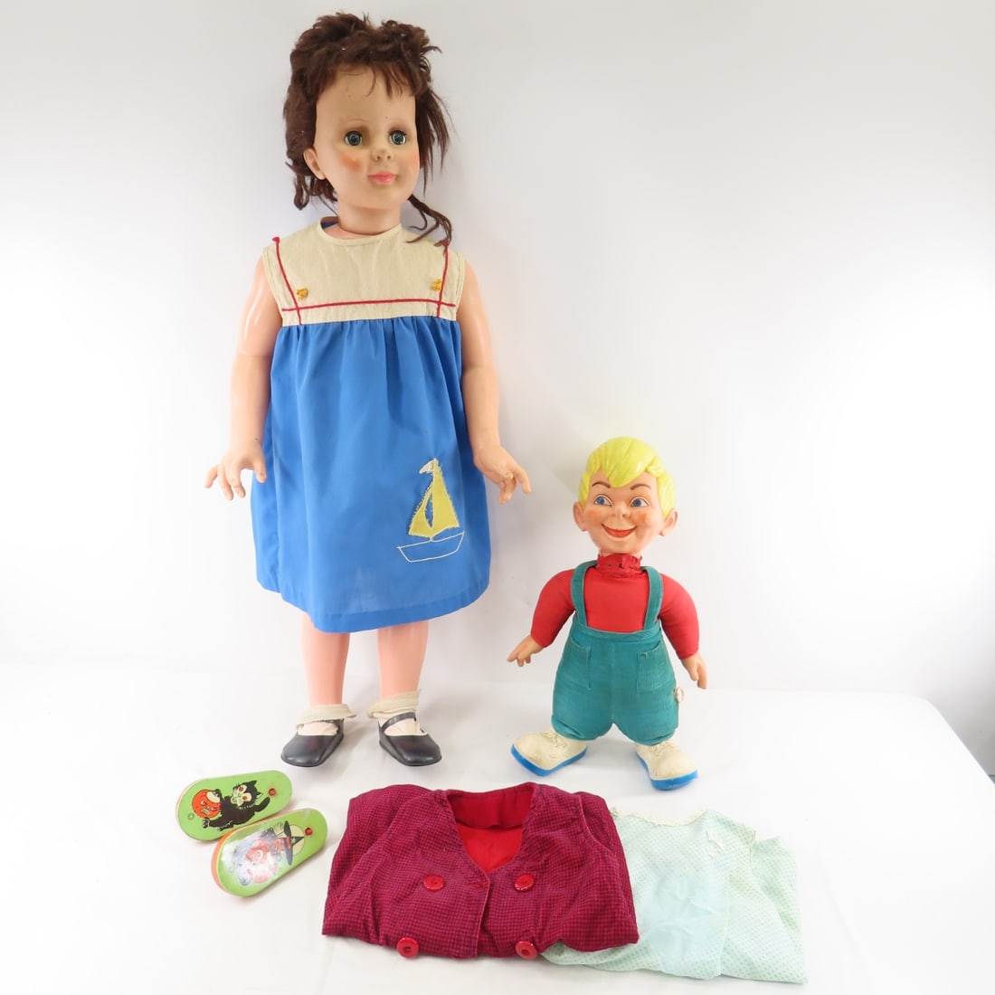 1950's Mattel Beany" Pull String & Other Doll: 1950's Mattel Beany" Pull String & Other Doll - Beany doll pull string works but is garbled, 36" unmarked vinyl doll with 2 extra dresses, 2 Halloween noisemakers. Lot size: 37 x 18 x 18". 8 lbs Photo