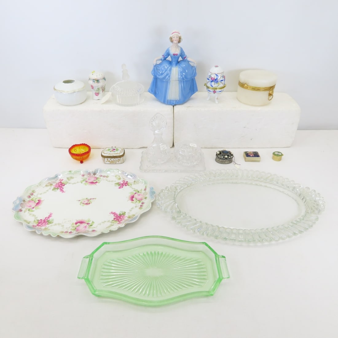 Vintage Vanity items, Limoges trinket box, 7 more: Vintage Vanity items, Limoges trinket box, 7 more - Tiffin Uranium glass dresser tray, Jeannette clear glass tray. other vintage trinket boxes and more. Lot Size 12x12x12" Photos are part of