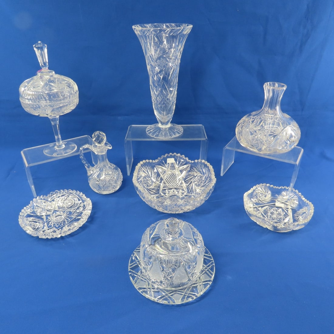 8 Pcs Early American Pattern & Cut Glass: 8 Pcs Early American Pattern & Cut Glass - 11" vase, 5.5" x 10.5" pedestal bowl with lid (flea bites on inside of lid rim), 2 6" bowls (minor flea bites). 7" cruet with stopper, 8" bowl (chip on