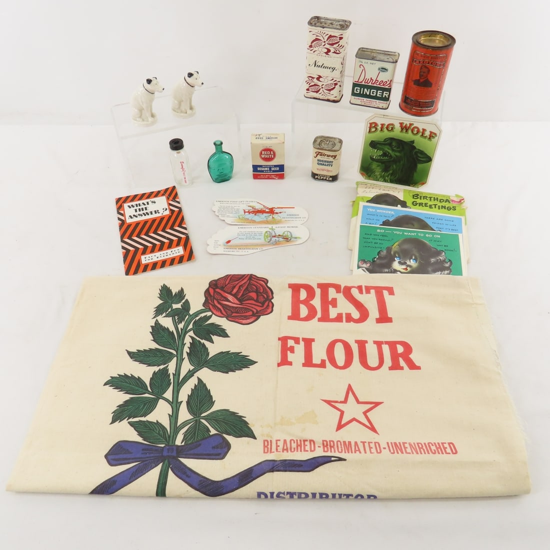 Antique Spice Tins, Advertising & More: Antique Spice Tins, Advertising & More - Emerson foot lift plows ad, Big Wolf labels, dog salt & pepper, Evenflo baby bottle, vintage birthday card, Blooming Best Flour bag, and more. Lot size: 12