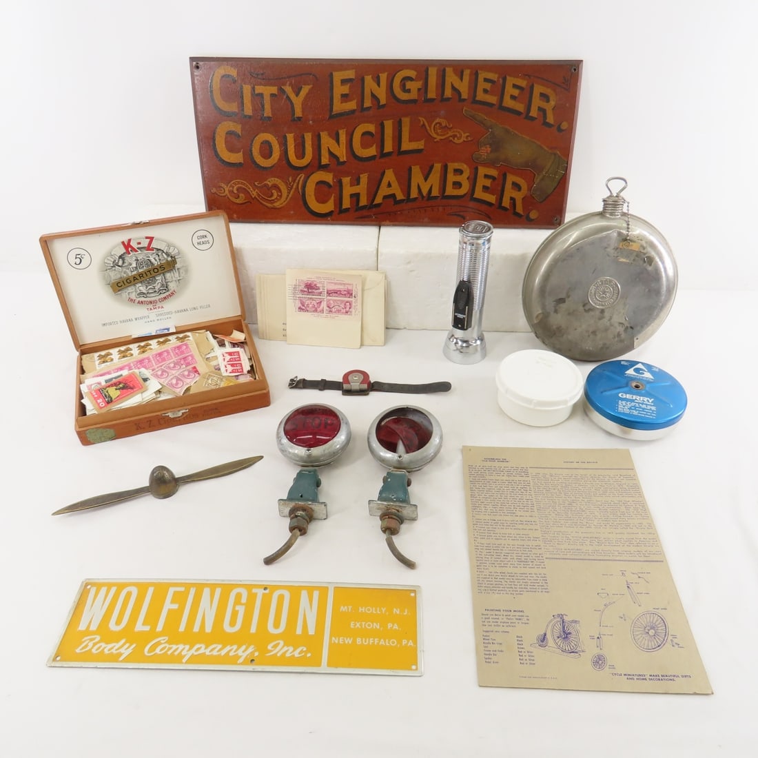 Vintage Sign, Lights, Stamps & more: Vintage Sign, Lights, Stamps & more - wood pained city council sign 20x9", metal STAR hot water bottle, Wolfington Body Co. sign, cigar box with stamps, Pin-o-Matic wrist magnet, flashlight, Hot