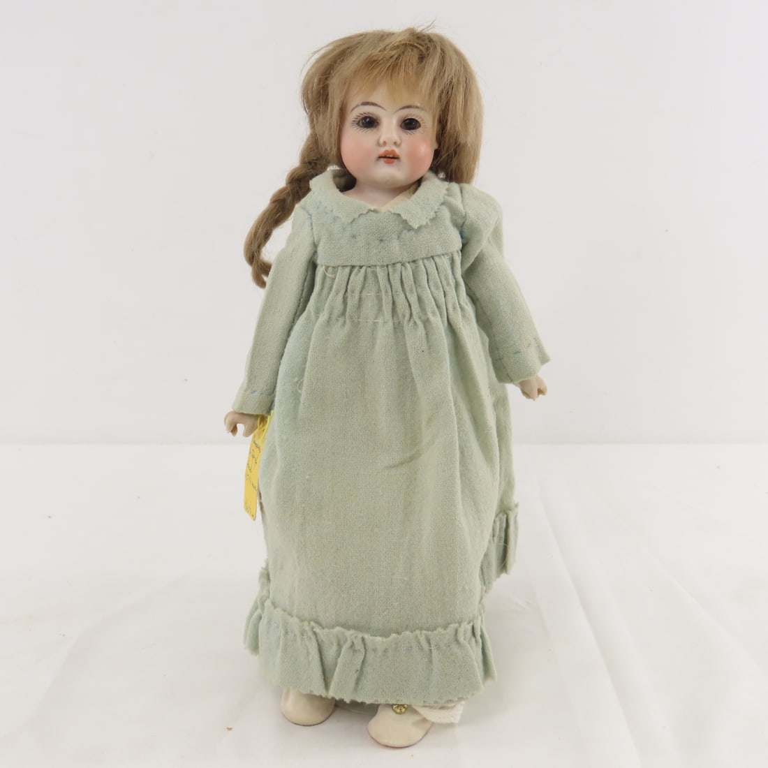 Antique 10" Kestner Bisque Head 154 Doll: Antique 10" Kestner Bisque Head 154 Doll - bisque shoulder hear (tag says head is marked 154- wig is glued and sewn so can't see), fixed eyes, painted lashes, open mouth with teeth, bisque hands,