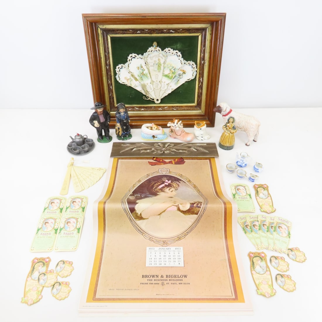 Cast Iron Amish Figures, Framed Calendar Fan: Cast Iron Amish Figures, Framed Calendar Fan - Wade & other figurines, doll house dishes, advertising hand fan and more. Frame measures 12.5x14.5x3", we can remove from frame for shipping at your