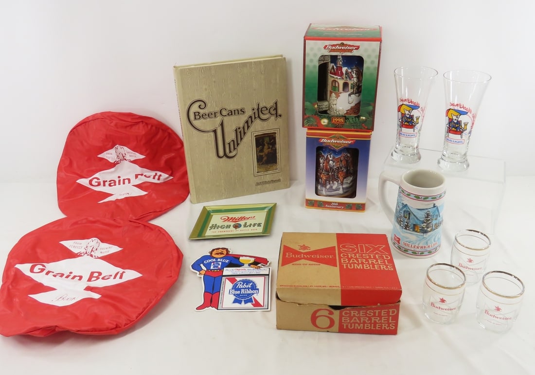 Budweiser & Grain Belt Glasses, Mugs & Collectible: Budweiser & Grain Belt Glasses, Mugs & Collectible - Grain Belt Stool Covers, Beer Cans Unlimited hardcover book. LOT SIZE 14X14X14" 15 LB Photos are part of description. (Live Auctioneers only