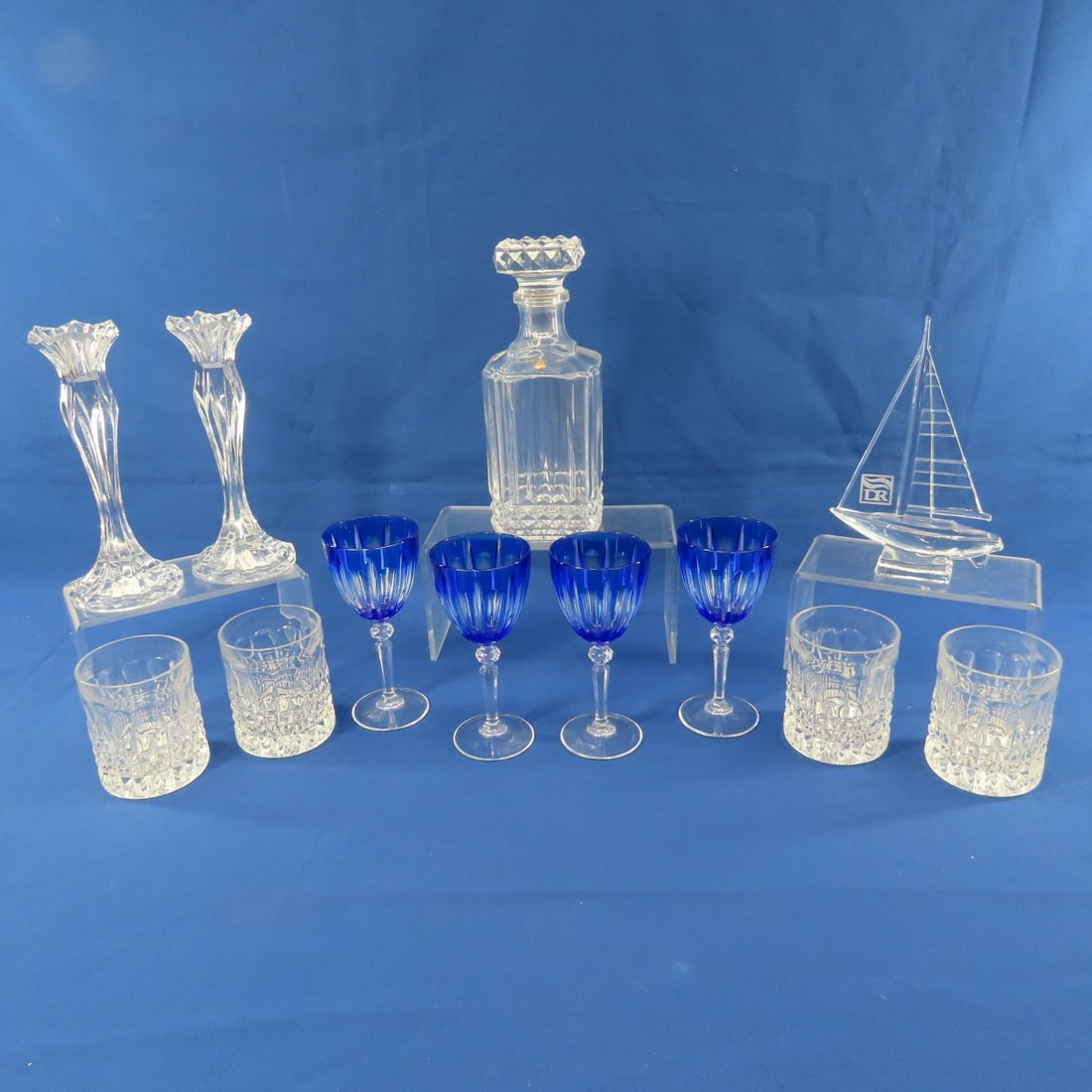 4 JG Durand Cristal D'Arques Crystal glasses: 4 JG Durand Cristal D'Arques Crystal glasses - Blue & Clear, Crystal Vases & Sailboat, Decanter & 4 Highball glasses. LOT SIZE 20X20X20" 15 LB Photos are part of description. (Live Auctioneers only