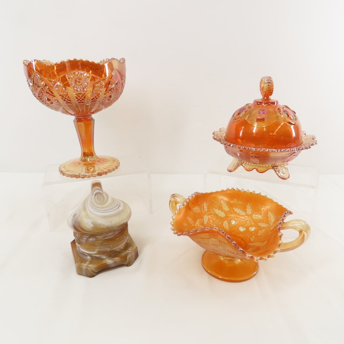 Marigold Carnival Glass & Slag Glass Honey Pot: Marigold Carnival Glass & Slag Glass Honey Pot - Northwood Fruits & Flowers bowl, Imperial Glass Dewey Butter Dish with lid, Imperial Glass Compote. LOT SIZE 14X14X14" 10 LB Photos are part of