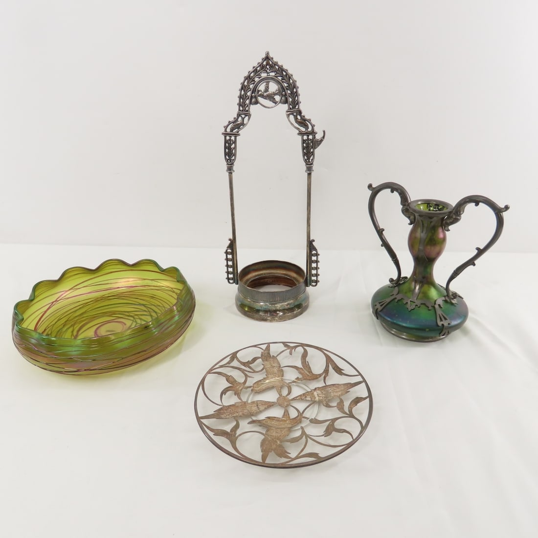 Art Nouveau Bohemian Austria Kralik Threaded bowl: Art Nouveau Bohemian Austria Kralik Threaded bowl - Vase, Pickle Caster piece, Riceszinn pewter & glass vase, part of the pewter is damaged, and more. LOT SIZE 14X10X10" 5 LB Photos are part of