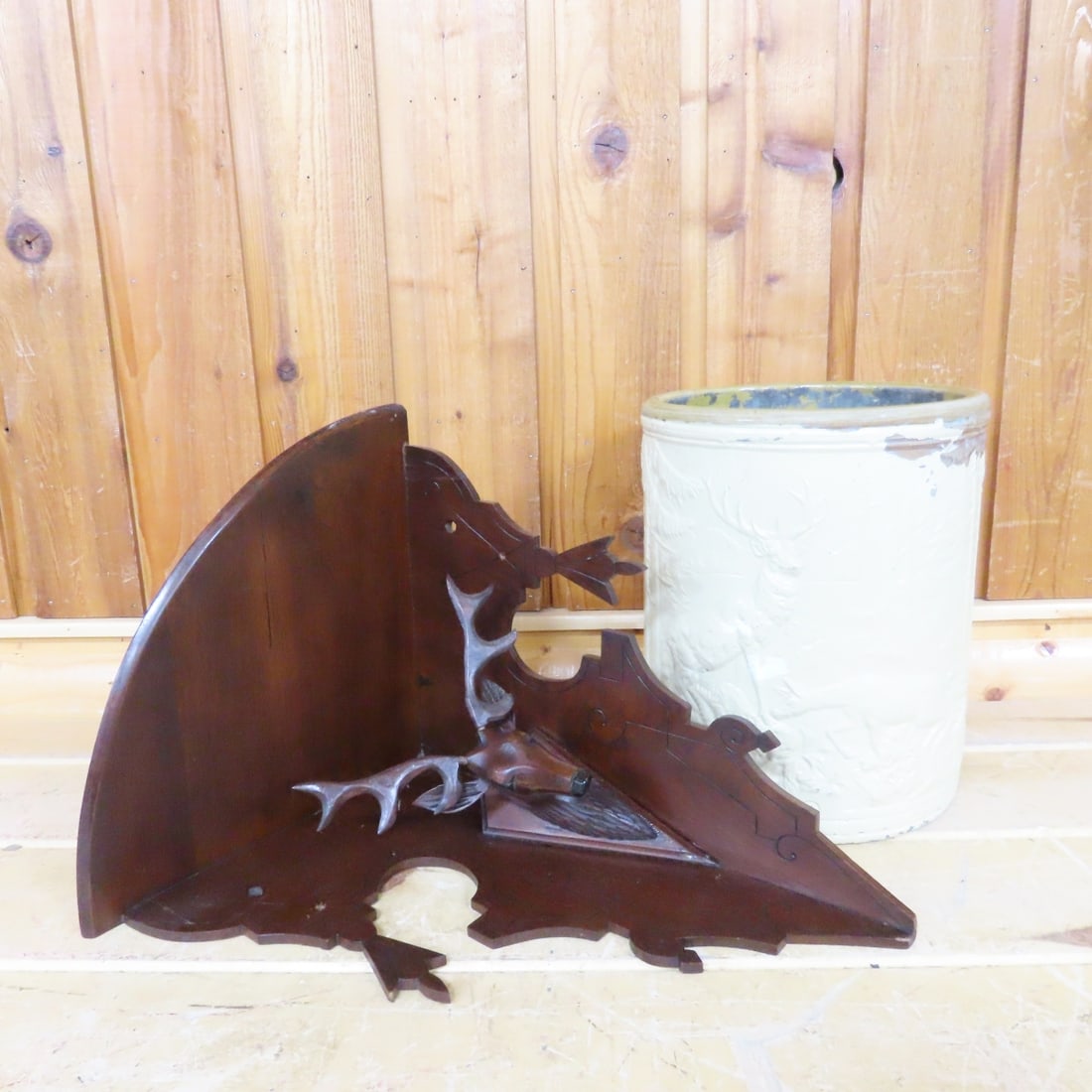 Victorian Style Corner Shelf, Early Red Wing Crock: Victorian Style Corner Shelf, Early Red Wing Crock - Victorian Style Corner Shelf with Stag Head, Early Embossed Red Wing Pottery Stag Crock- has damage. Shipped in 2 Boxes. Lot #1: 24 x 24 x 20",