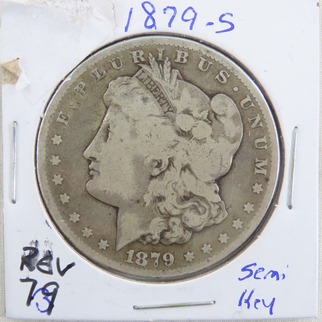 1879 S Morgan Silver Dollar: 1879 S Morgan Silver Dollar - Lot Size 3x3x3" 1 LB Photos are part of description. (Live Auctioneers only shows a max of 20 photos). Please ask questions and read terms & conditions before bidding.