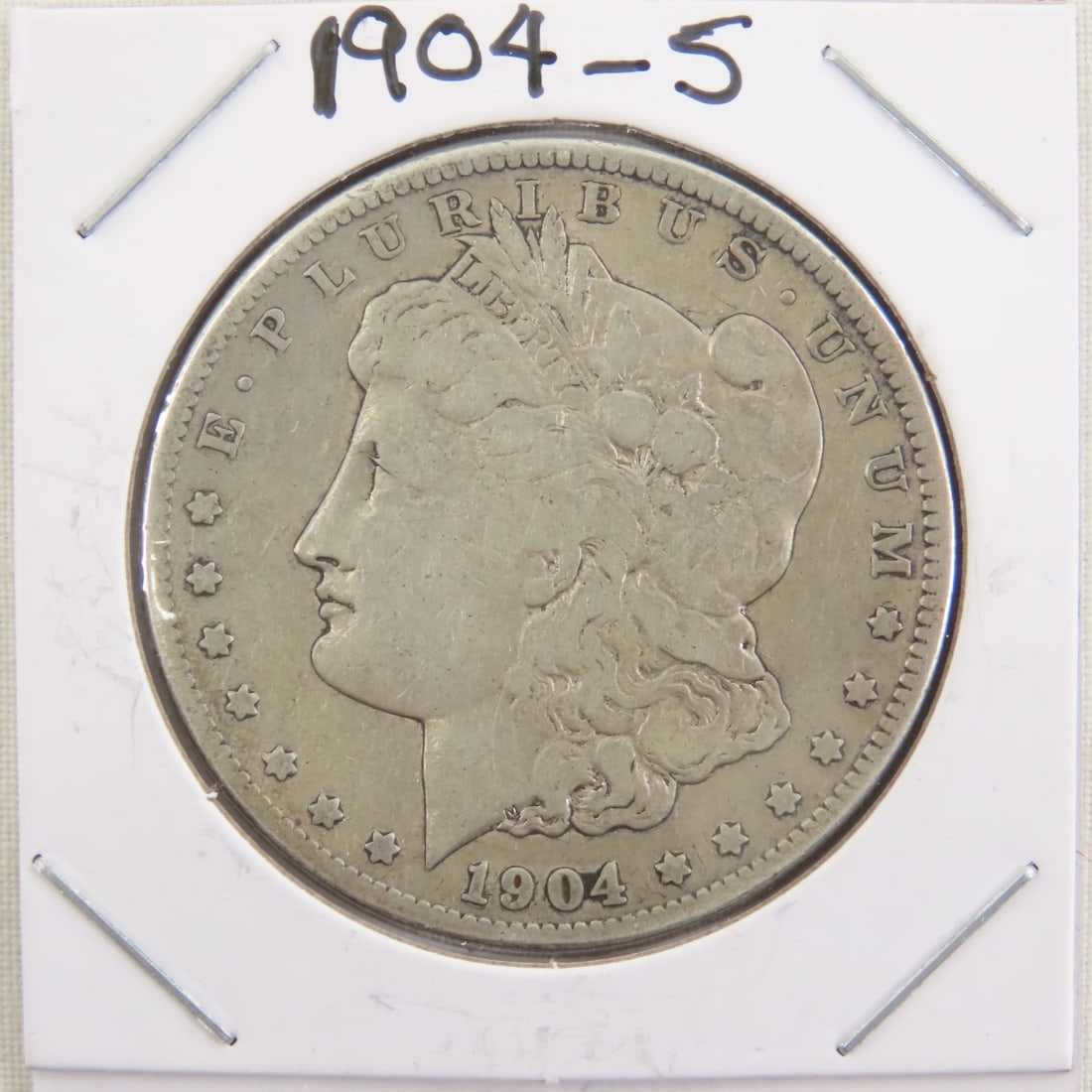 1904 S Morgan Silver Dollar: 1904 S Morgan Silver Dollar - Lot Size 3x3x3" 1 LB Photos are part of description. (Live Auctioneers only shows a max of 20 photos). Please ask questions and read terms & conditions before bidding.
