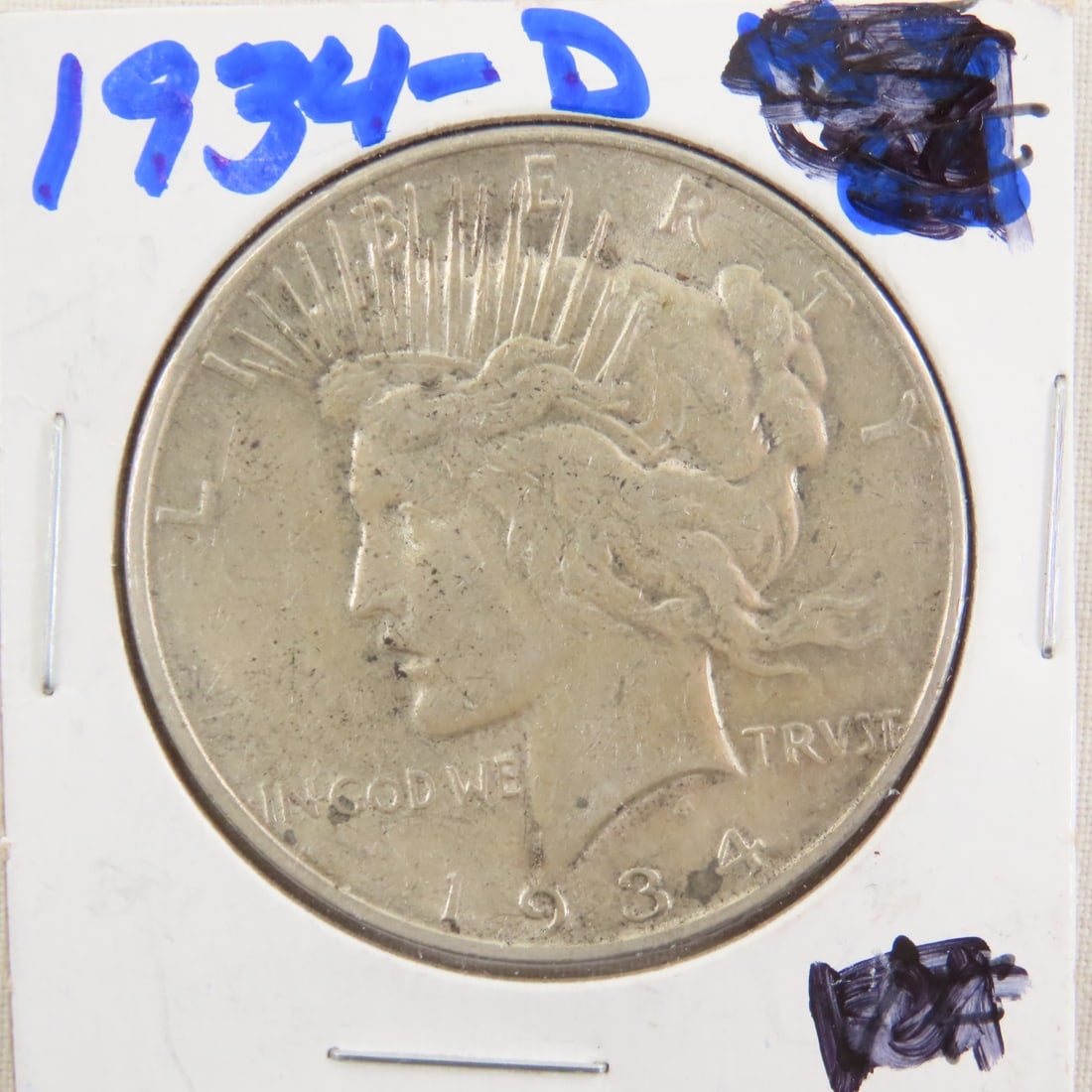1934 D Peace Silver Dollar: 1934 D Peace Silver Dollar - Lot Size 3x3x3" 1 LB Photos are part of description. (Live Auctioneers only shows a max of 20 photos). Please ask questions and read terms & conditions before bidding.