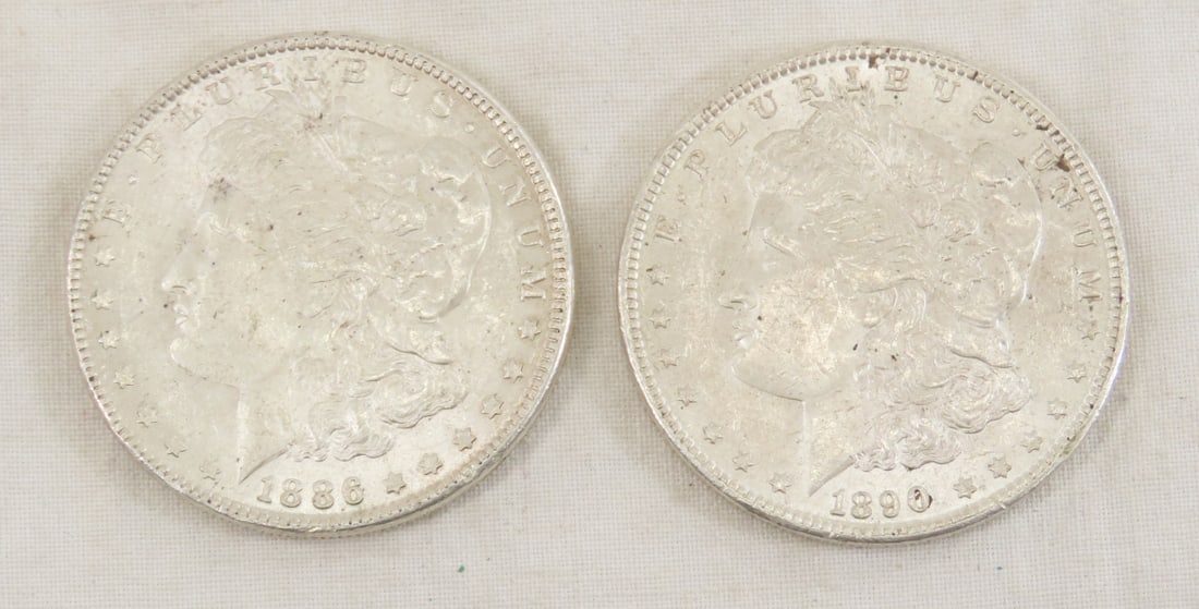 1886 & 1890 Morgan Silver Dollars: 1886 & 1890 Morgan Silver Dollars - Lot Size 3x3x3" 1 LB Photos are part of description. (Live Auctioneers only shows a max of 20 photos). Please ask questions and read terms & conditions before