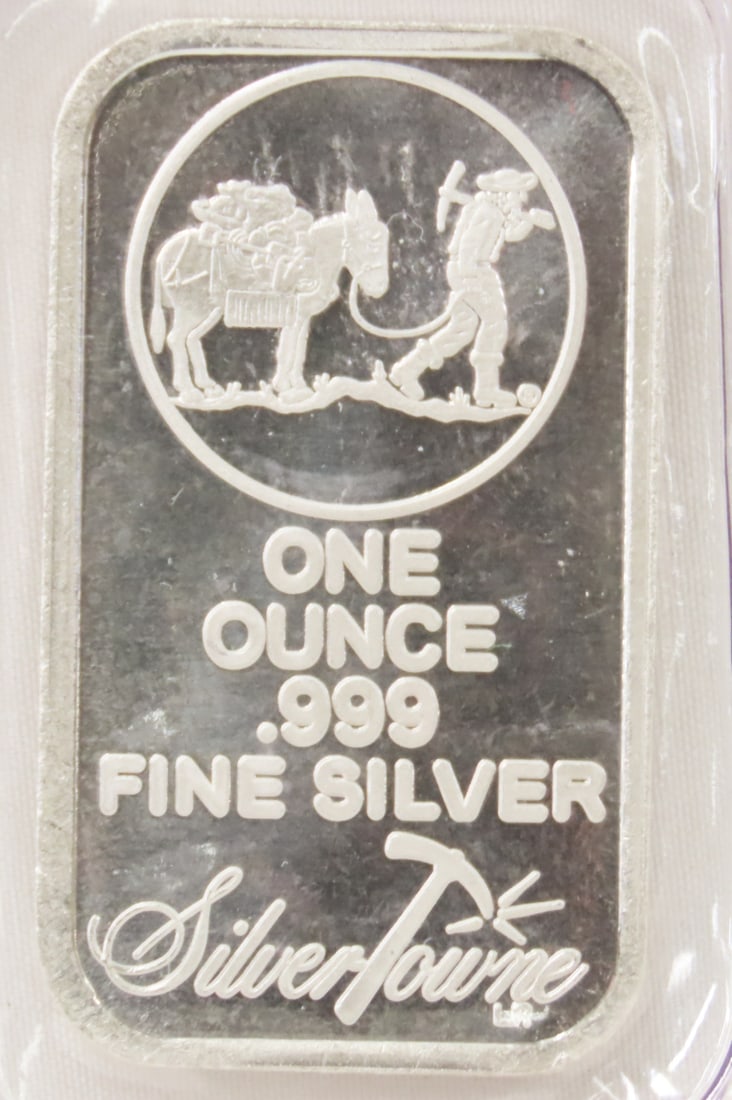1 ozt .999 Silver Bar Silver Towne: 1 ozt .999 Silver Bar Silver Towne - Lot Size 3x3x3" 1 LB Photos are part of description. (Live Auctioneers only shows a max of 20 photos). Please ask questions and read terms & conditions before
