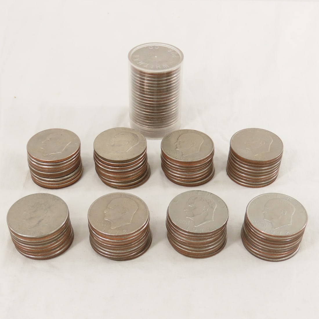 100 Mixed Date Eisenhower Dollars: 100 Mixed Date Eisenhower Dollars - Lot Size 5x5x5" 3 LB Photos are part of description. (Live Auctioneers only shows a max of 20 photos). Please ask questions and read terms & conditions before