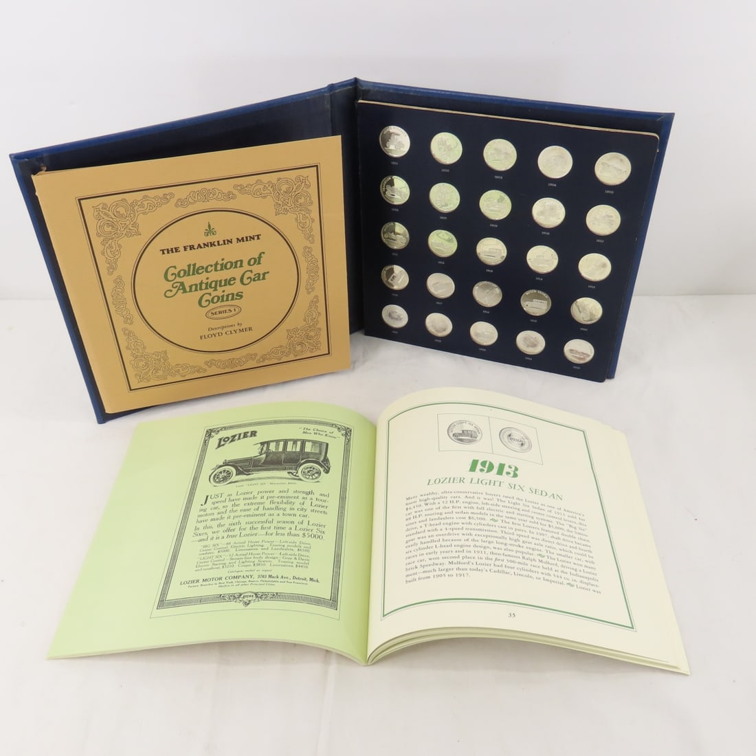 Franklin Mint Sterling Silver Antique Car Coins: Franklin Mint Sterling Silver Antique Car Coins - Series 1 set, 25 Sterling Silver coins in original book with box and Book by Floyd Clymer. 6.25 OZT .925 Silver. LOT SIZE 10X10X2" 4 LB Photos are