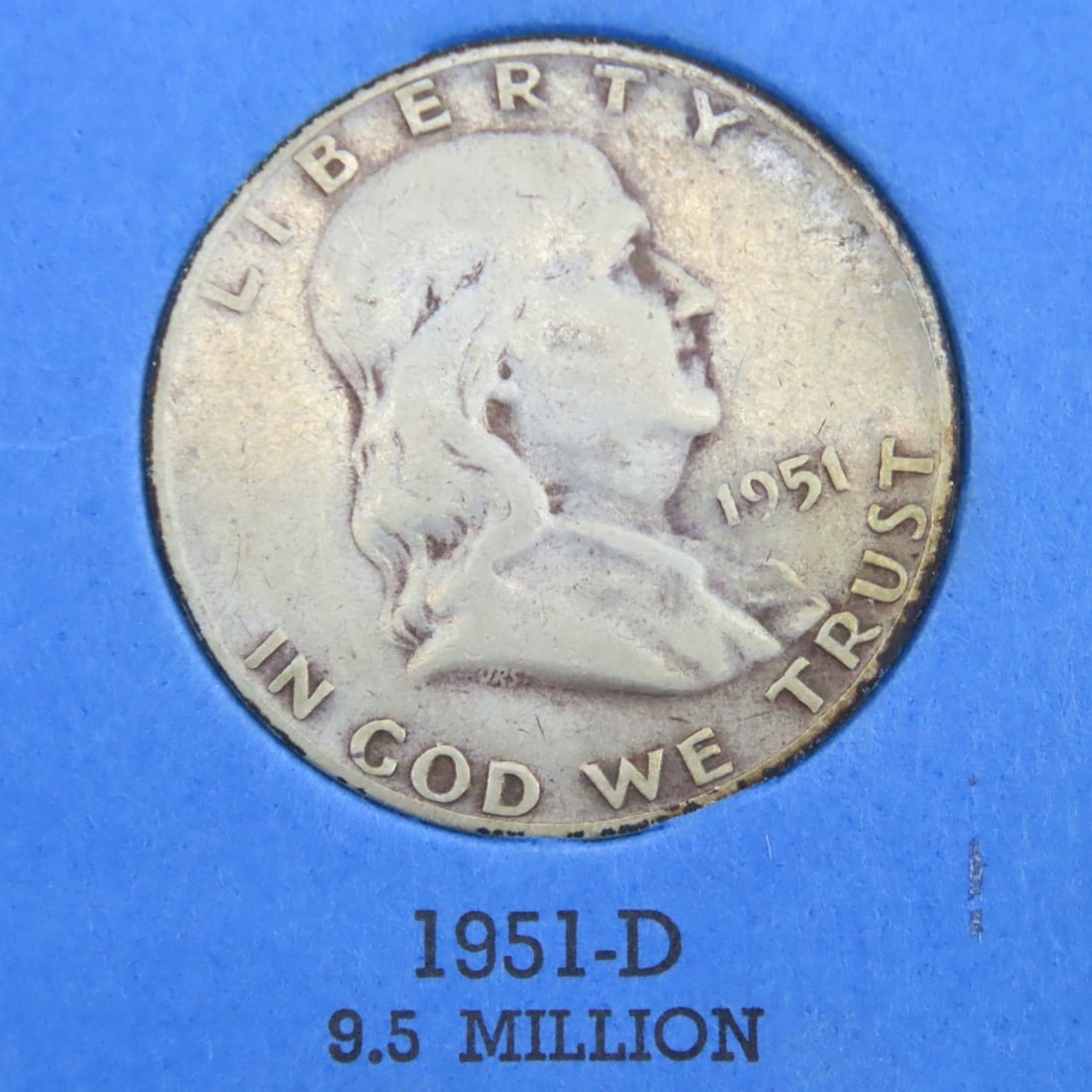 7 Franklin Silver Half Dollars in book - 2