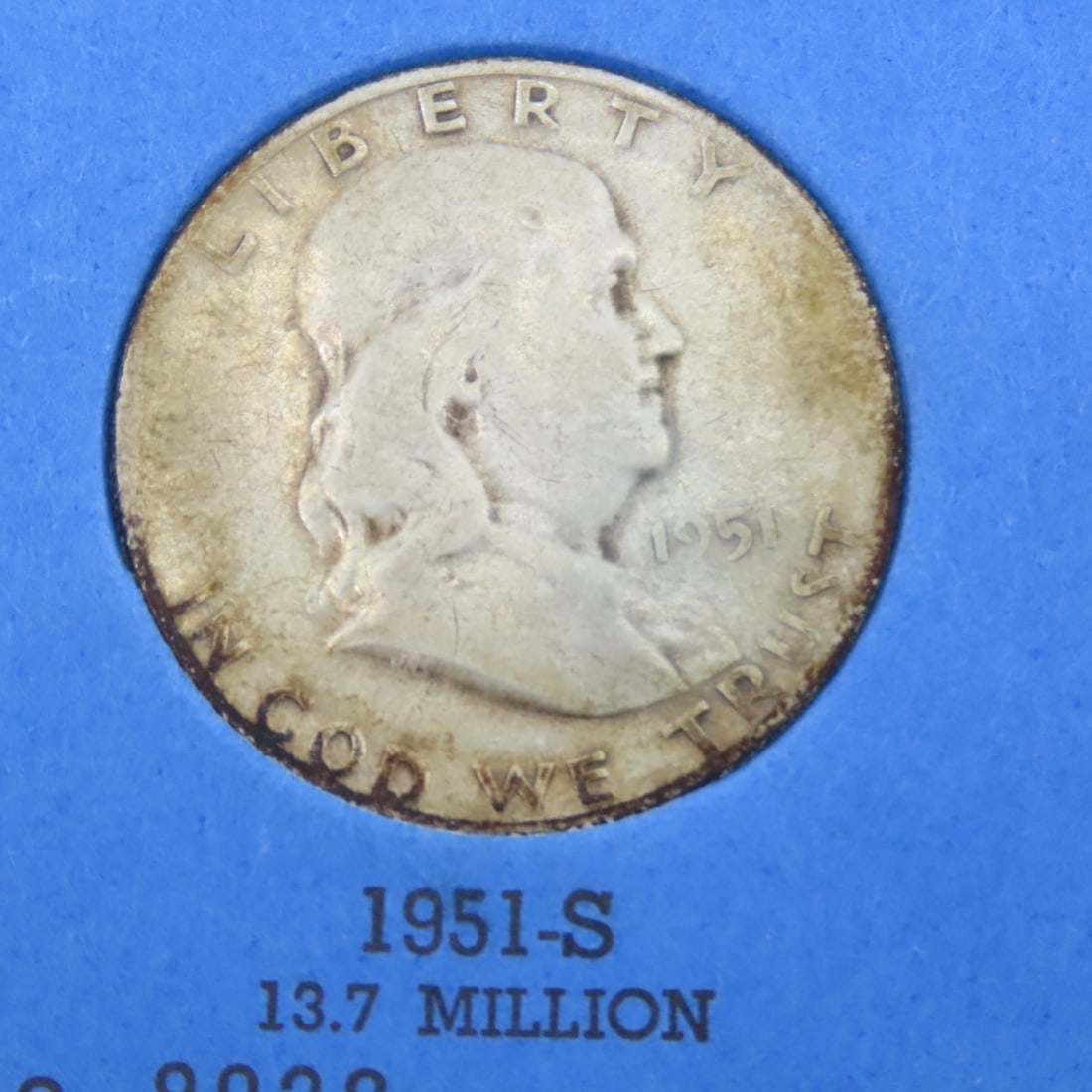 7 Franklin Silver Half Dollars in book - 3